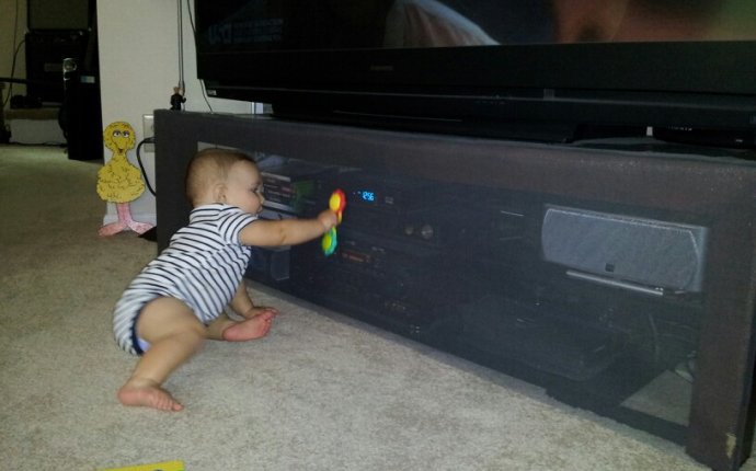 Baby Proofing the entertainment center: window screen material and